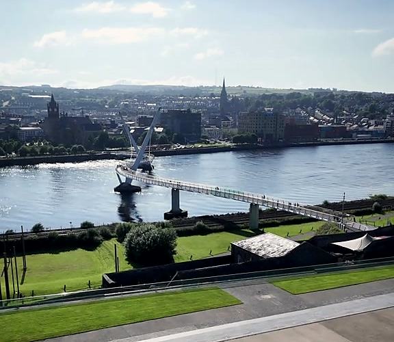 The Peace Bridge and the River Foyle in Derry, seen from Ebrington.